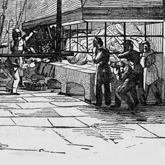 Gilders in a factory wearing face protection